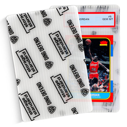 Close-up of Ding Defend 4 x 6 trading card shipping protector partially covering a graded trading card inside a clear plastic holder